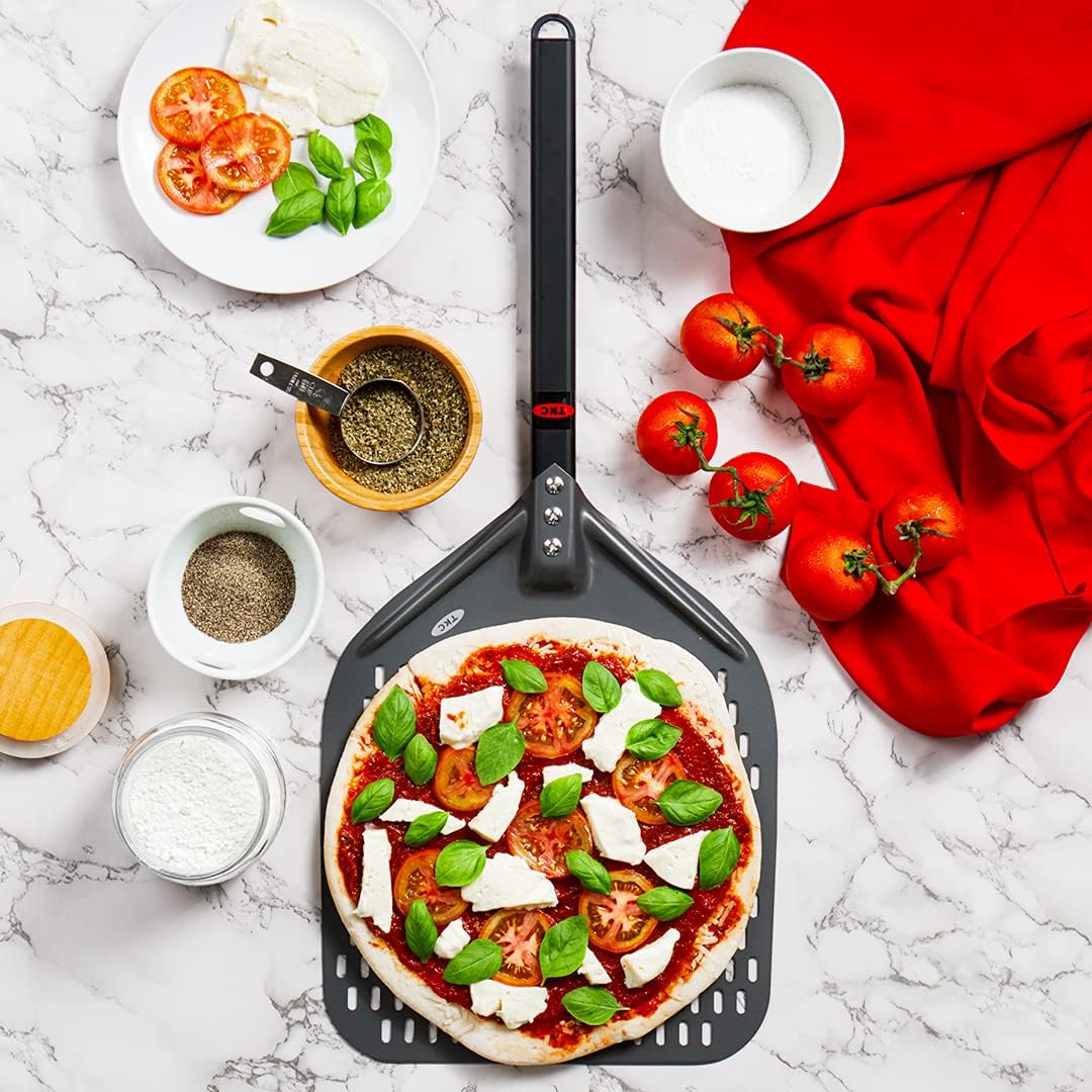 TKC Perforated Pizza Peel - 12" Metal Pizza Turner compatible with All Ovens, Indoor & Outdoor Use, Durable and Heat-Resistant Handle, Lightweight Pizza Spatula (Black)