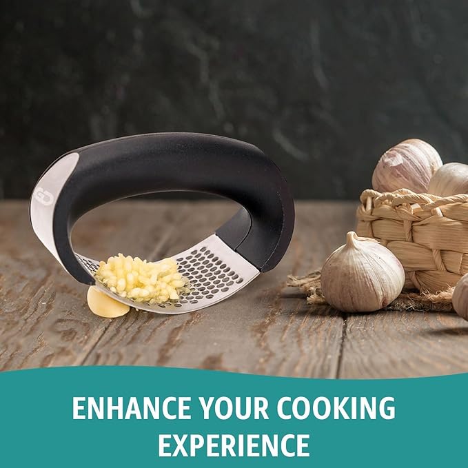 GD Garlic press rocker, crusher, mincer tool stainless steel with a Garlic Peeler, spatula, and Brush extract more Garlic Paste. The Garlic Mincer Tool Squeezes, Extracts, Crushes