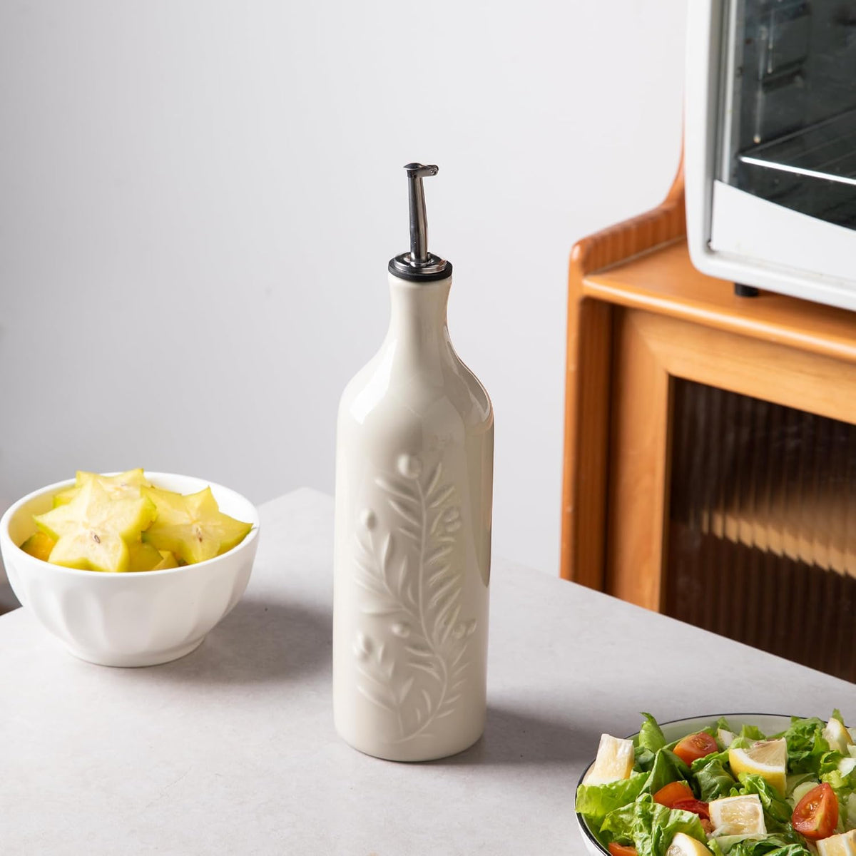 Sweejar Large Olive Oil Dispenser Bottle with Spout, 24 Oz Ceramic Oil Dispenser for Kitchen, Relief Opaque Oil Cruet, Oil Container for Cooking, EVOO, Avocado Oil, Vinegar, Pack of 1 (Beige)