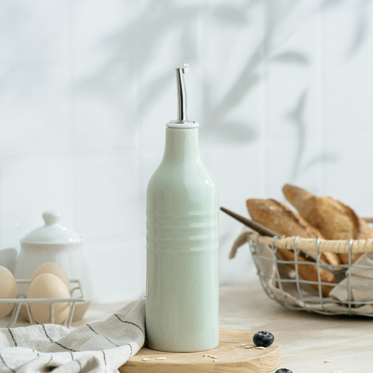 famiware Jupiter 16oz Ceramic Olive Oil Dispenser Bottle, 1 Piece Oil Dispenser for Kitchen with Stainless Steel Pourers, Suitable for Storage Vinegar, Soy Sauce, Coffee Syrup, Light Green