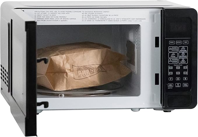 West Bend Microwave Oven 700-Watts Compact with 6 Pre-Set Cooking Settings, Speed Defrost, Electronic Control Panel and Glass Turntable, 0.7 Cu.Ft., Black