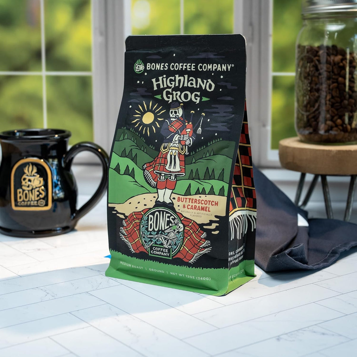 Bones Coffee Company Highland Grog, Butterscotch Caramel Flavored Coffee, Medium Roast Low Acid Arabica Beans Compatible with Auto drip and French Press Coffee Maker, 12 Oz Ground