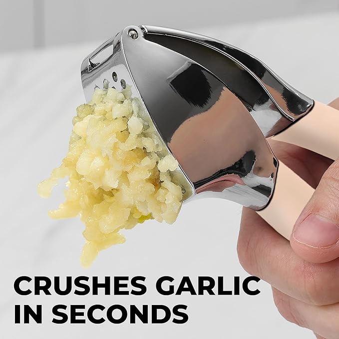 Zulay Kitchen Comfort Grip Garlic Press - Garlic Mincer Tool - Garlic Crusher - Garlic Press Mincer Rust Proof, with Soft Ergonomic Handle, Easy Clean Set with Peeler and Brush - Light Pink