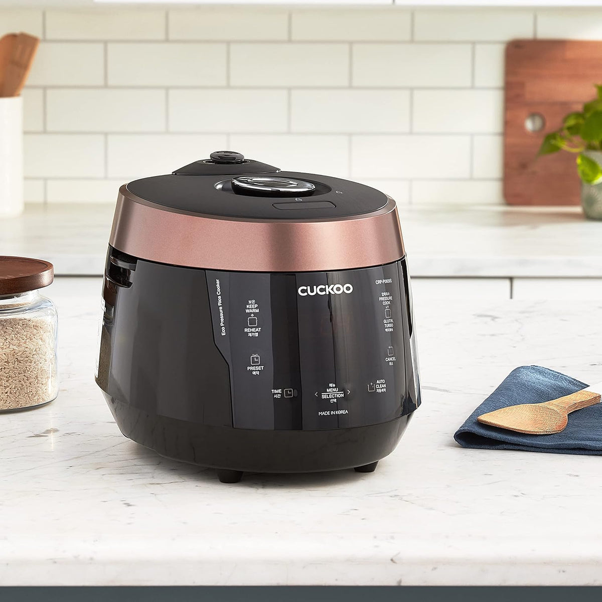 CUCKOO CRP-P0609S 6-Cup (Uncooked) / 12-Cup (Cooked) High Pressure Rice Cooker & Warmer with Nonstick Inner Pot, 12 Menu Options, Fuzzy Logic Tech, 3 Voice Guide, Auto Clean (Black/Copper)